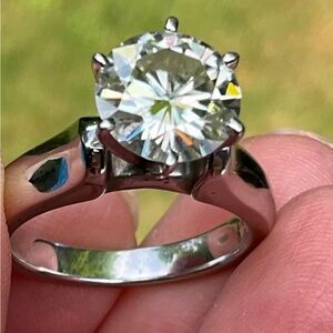 14K white gold ring Moissanite solitaire.